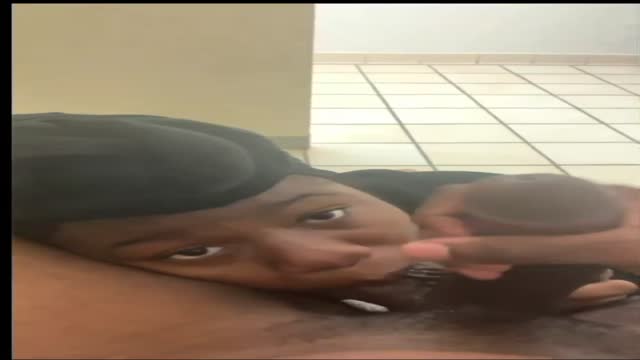 Ball sucking and catching nut in a public bathroom