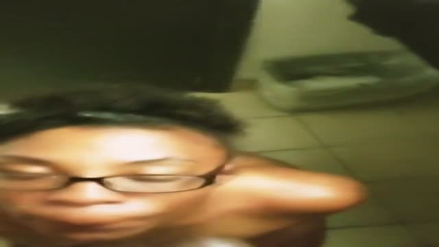 Cumshot to the face in the bathroom