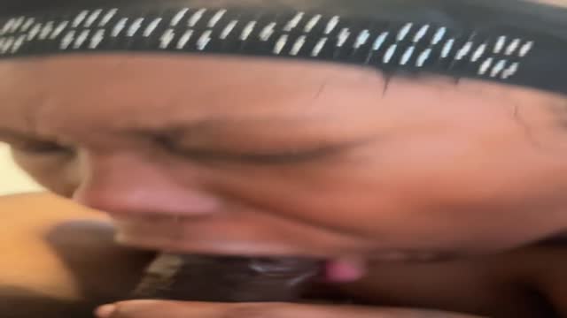 Gobbling up his cum with her feet up